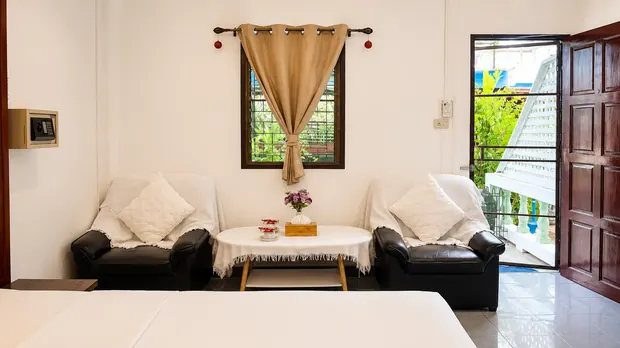 Room seating corner beside the balcony door