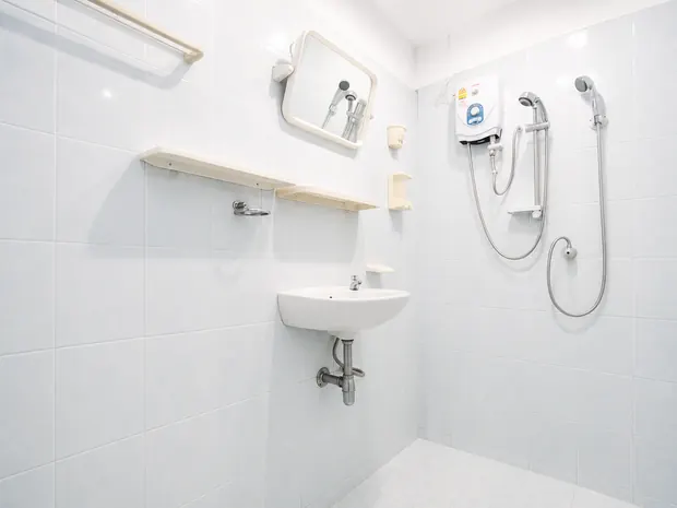 Bathroom with hot shower and sink