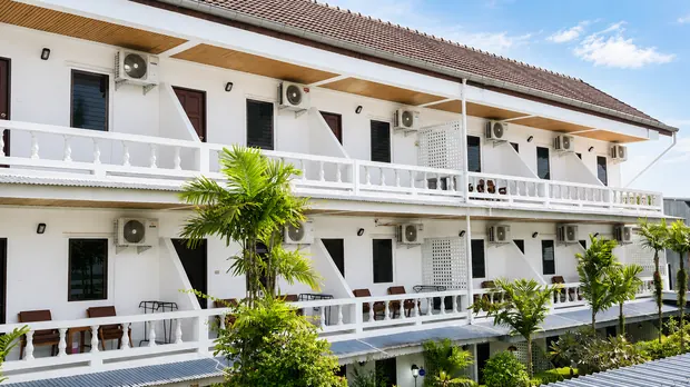 Hotel exterior with white balconies